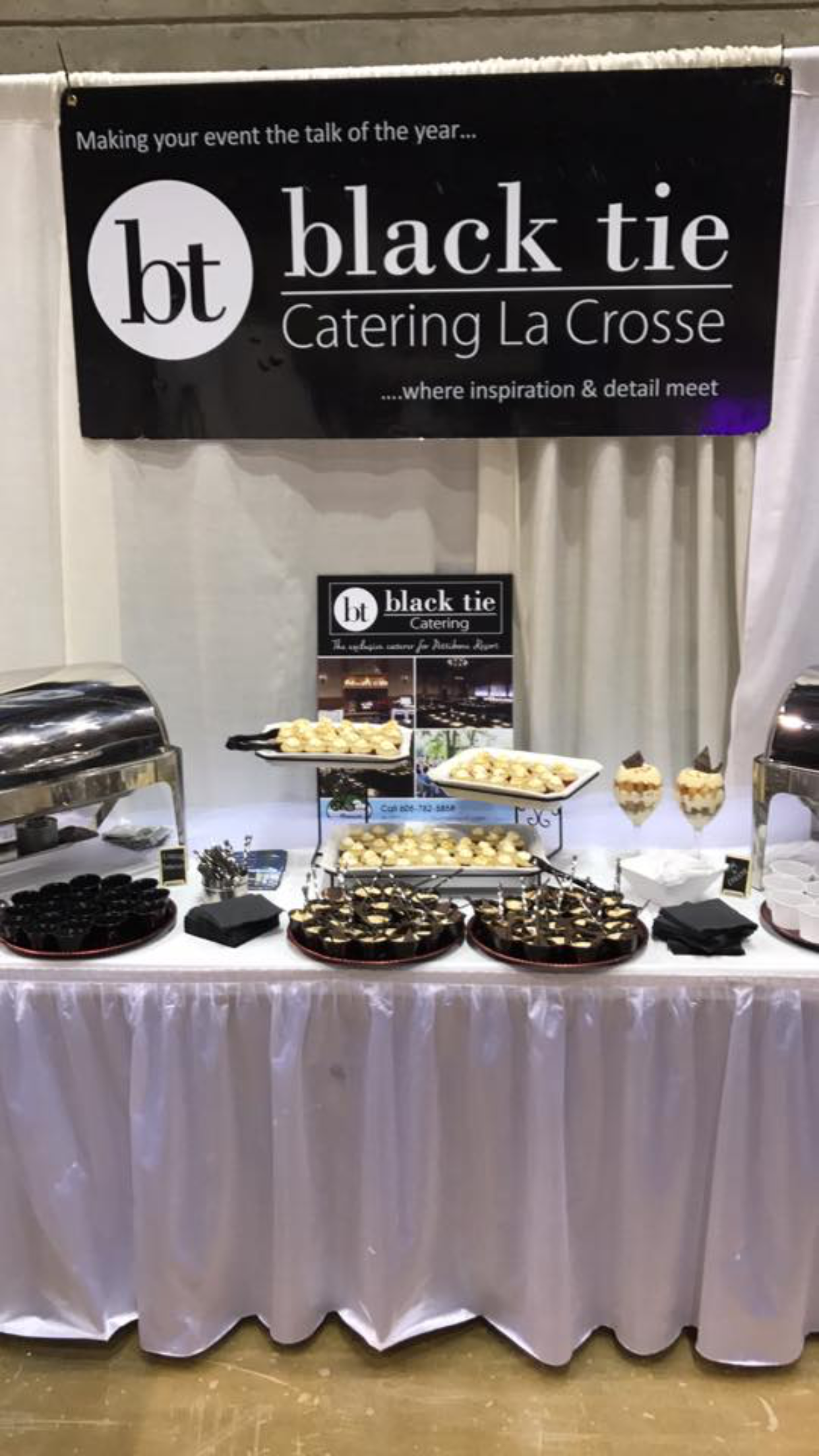 Black Tie Catering booth on display at the La Crosse 2017 Wedding Expo