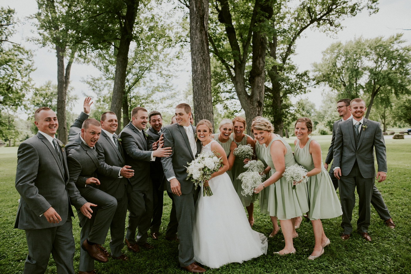 Wedding party gathered together for group photo